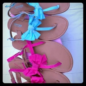 pair of pink and teal girls sandals
